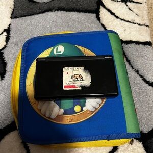 Nintendo DS Black Handheld Console with Blue and Yellow Case W/ games